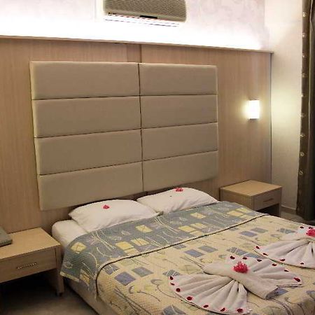 Ozcan Beach Hotel Турунч Экстерьер фото